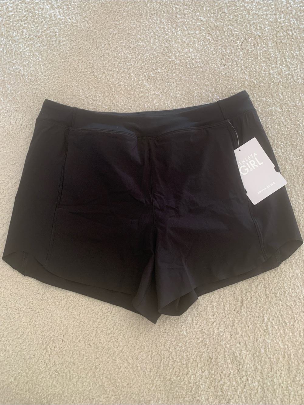 Athleta Girl 
On your mark 2.5 short
NWT 
Girls XXL